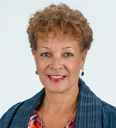 Professional headshot of a woman used to represent a nonprofit leadership profile at DSG Global.